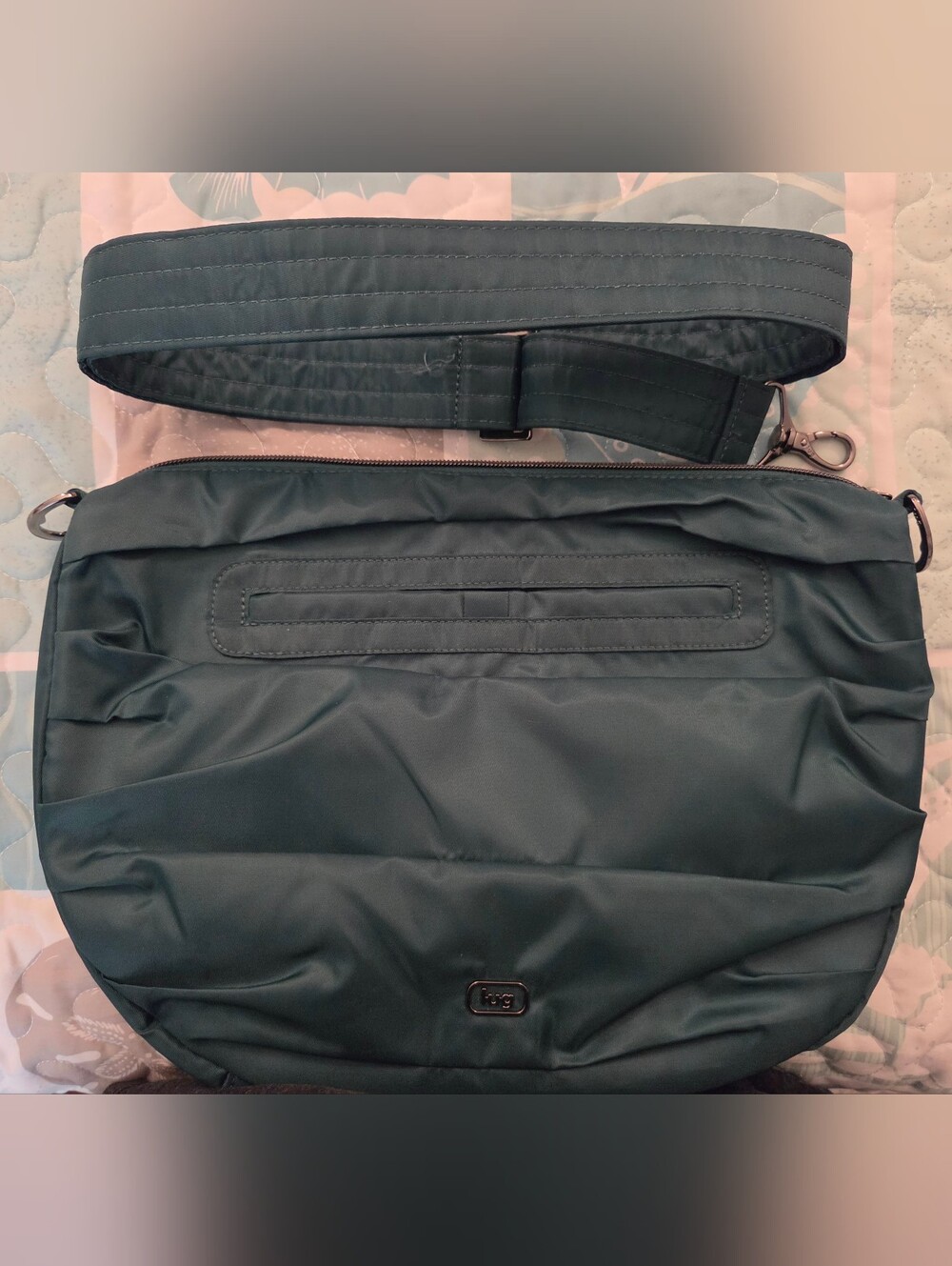 Lug scuffle pleated crossbody bag in wicked green color